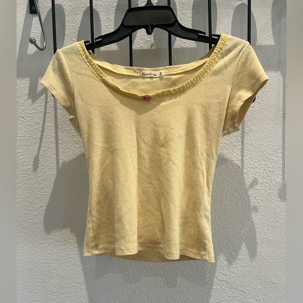 Heart and hips brand size medium yellow T with flower embellishment